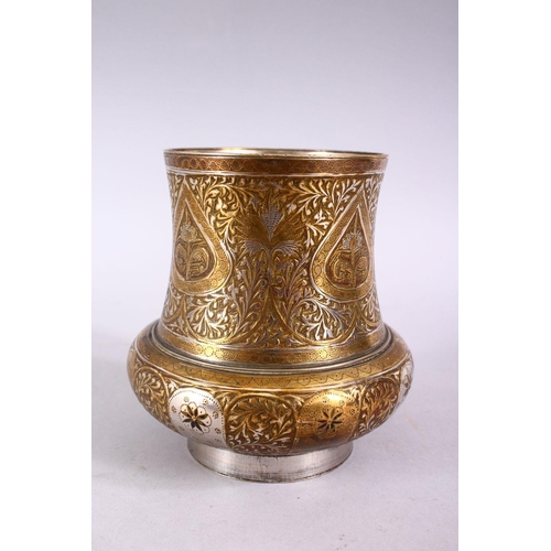 699 - A SMALL INDIAN ENGRAVED BRASS AND WHITE METAL CIRCULAR VASE, 11cm high.