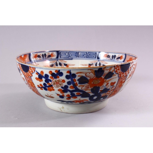 7 - A JAPANESE EDO / MEIJI PERIOD IMARI PORCELAIN BOWL,  decorated with panel displays of native flora a... 