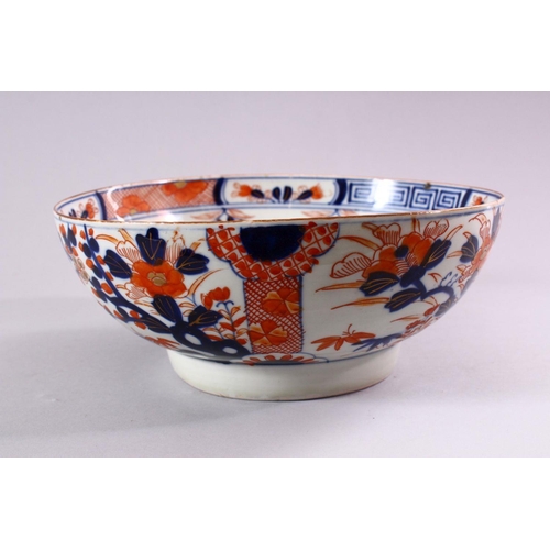 7 - A JAPANESE EDO / MEIJI PERIOD IMARI PORCELAIN BOWL,  decorated with panel displays of native flora a... 