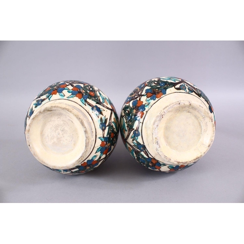 719 - A LARGE PAIR OF 19TH CENTURY OTTOMAN TURKISH KUTAHIYA LIDDED PORCELAIN BOTTLE VASES,each with floral... 