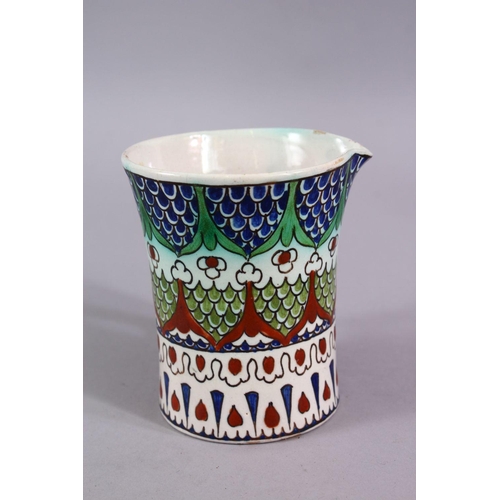 721 - A 19TH CENTURY IZNIK STYLE CANTAGALLI JUG, with floral panel motif, 10cm.