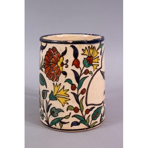 726 - AN UNUSUAL JERUSALEM ARMINIAN GLAZED POTTERY TANKARD, Painted with floral spray and a panel of writi... 