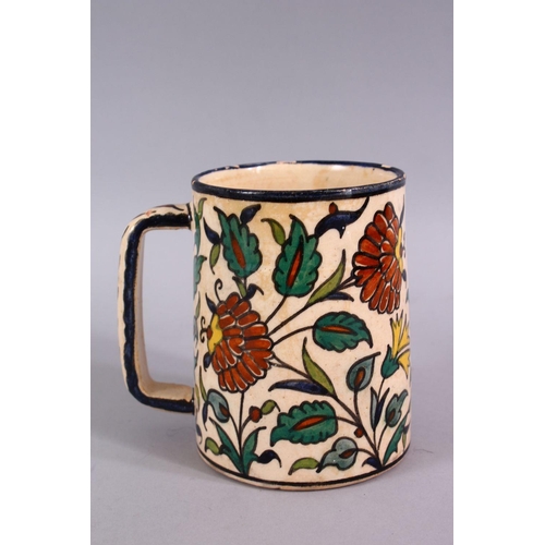 726 - AN UNUSUAL JERUSALEM ARMINIAN GLAZED POTTERY TANKARD, Painted with floral spray and a panel of writi... 