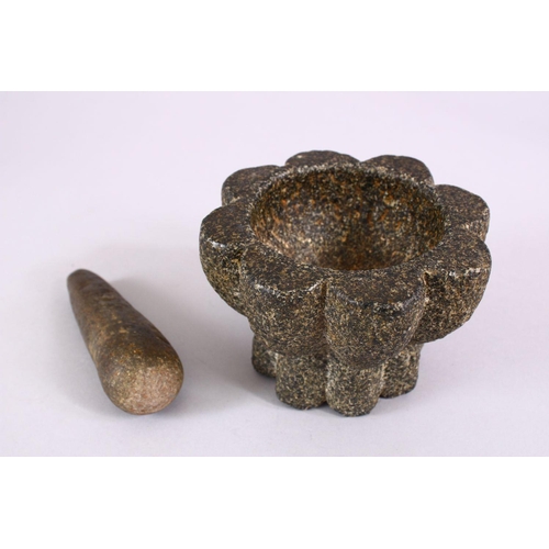 727 - AN EARLY ISLAMIC POSSIBLY ANDALUSIAN HISPANO MORESQUE STONE PESTLE AND MORTAR, mortar: 8.5cm 11.5cm.