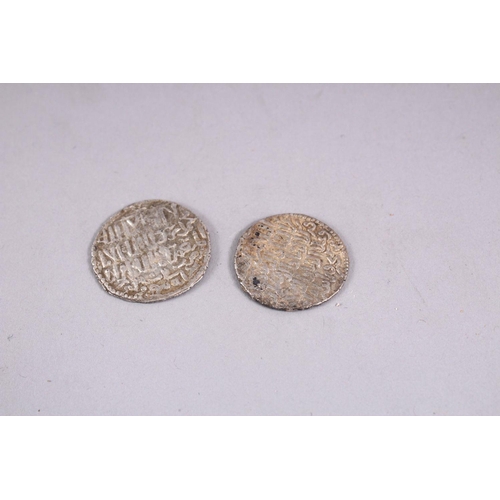 732 - TWO EARLY SILVER ISLAMIC COINS.