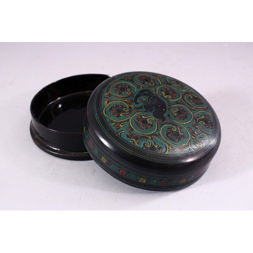 738 - AN INDIAN PAPIER MACHE CIRCULAR BOX AND COVER, 12cm diameter.