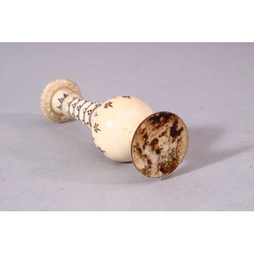 740 - A 19TH CENTURY INDIAN TURNED IVORY NEEDLE CASE, 10.5cm high.