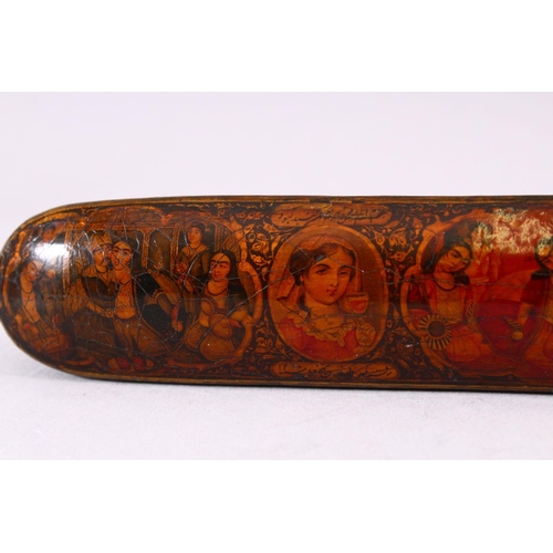 743 - A GOOD QAJAR QUALAMDAN / PAPIER MACHE PENBOX, well painted with portrait busts and figure groups, 21... 