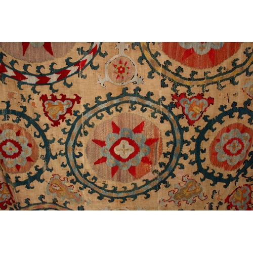 755 - AN EARLY SUZANI TEXTILE consisting of five stitched panels embroidered with palmettes and stylised f... 