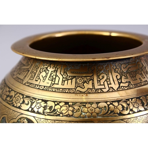 761 - A GOOD ISLAMIC BRASS TRIPLE FOOT CALLIGRAPHIC BOWL, with panels of figures and bands of calligraphy,... 