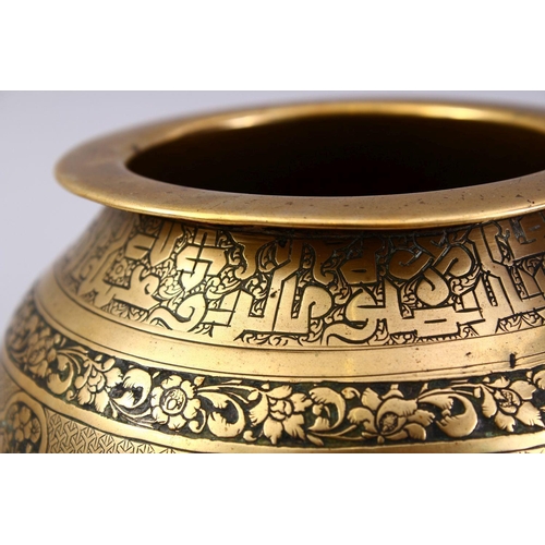 761 - A GOOD ISLAMIC BRASS TRIPLE FOOT CALLIGRAPHIC BOWL, with panels of figures and bands of calligraphy,... 