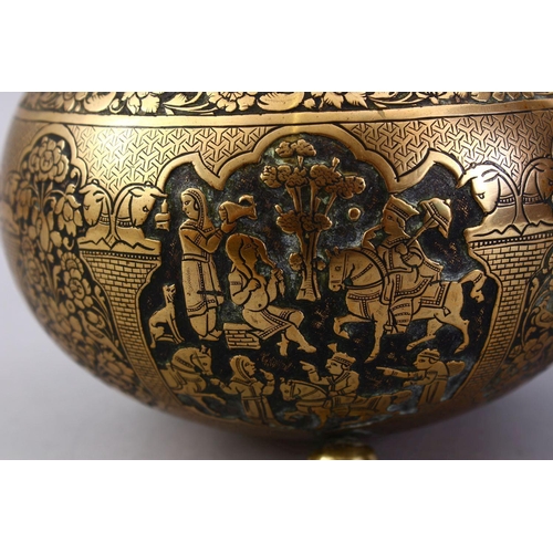 761 - A GOOD ISLAMIC BRASS TRIPLE FOOT CALLIGRAPHIC BOWL, with panels of figures and bands of calligraphy,... 