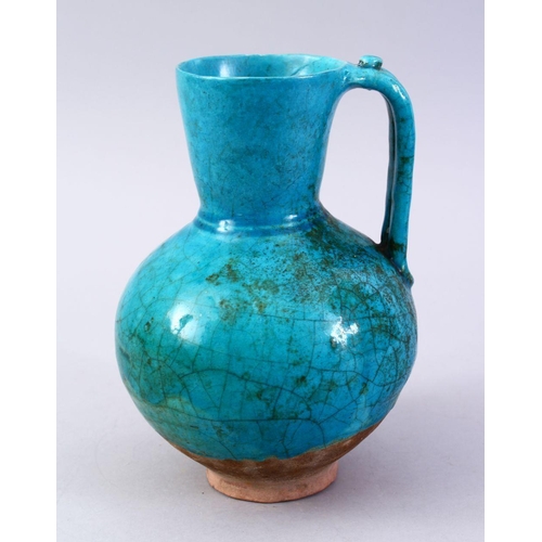 764 - A GOOD EARLY TURQUOISE GLAZED POTTERY EWER, 20cm high.