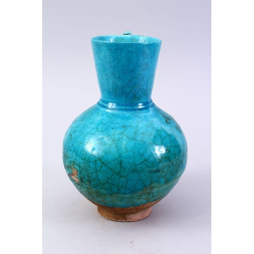 764 - A GOOD EARLY TURQUOISE GLAZED POTTERY EWER, 20cm high.