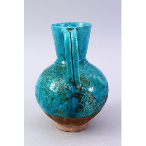 764 - A GOOD EARLY TURQUOISE GLAZED POTTERY EWER, 20cm high.