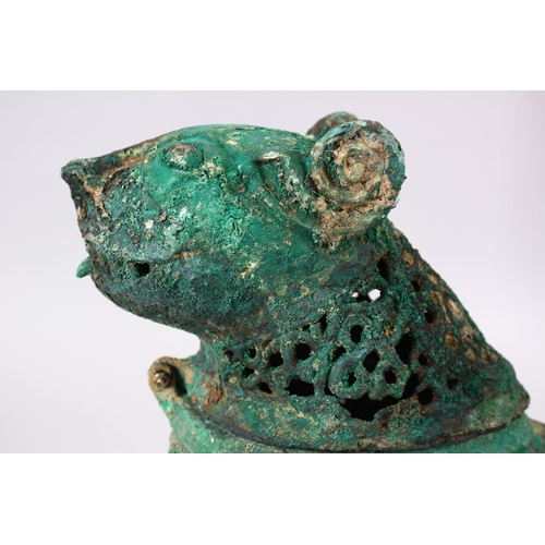 768 - AN ISLAMIC STYLE BRONZE OPENWORK INCENSE BURNER IN THE FORM OF A LION,  40cm.