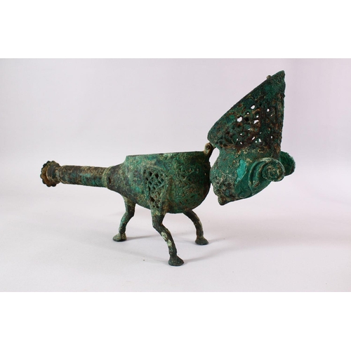 768 - AN ISLAMIC STYLE BRONZE OPENWORK INCENSE BURNER IN THE FORM OF A LION,  40cm.