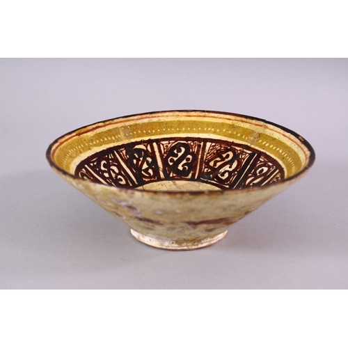 773 - A 12TH CENTURY ISLAMIC / PERSIAN POTTERY BOWL, with brown decorated panels, upon biscuit colour glaz... 