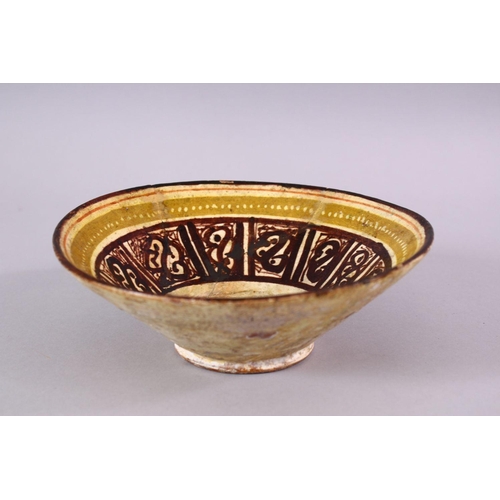 773 - A 12TH CENTURY ISLAMIC / PERSIAN POTTERY BOWL, with brown decorated panels, upon biscuit colour glaz... 