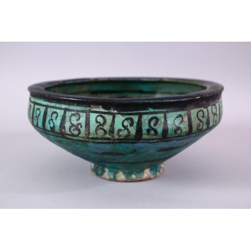 774 - AN EARLY PERSIAN TURQUOISE POTTERY BOWL, decorated with floral motif, 19cm (af)