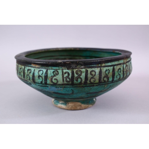 774 - AN EARLY PERSIAN TURQUOISE POTTERY BOWL, decorated with floral motif, 19cm (af)