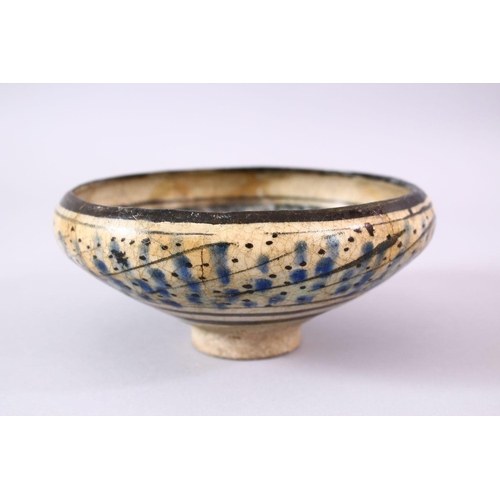 776 - AN EARLY PERSIAN SULTAN ABBAD POTTERY BOWL, with floral decoration, 16cm.