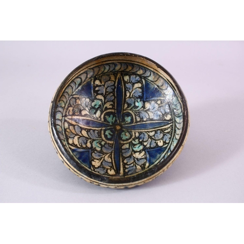 776 - AN EARLY PERSIAN SULTAN ABBAD POTTERY BOWL, with floral decoration, 16cm.