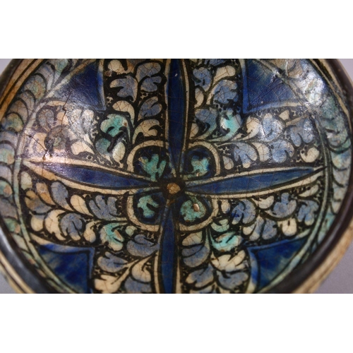 776 - AN EARLY PERSIAN SULTAN ABBAD POTTERY BOWL, with floral decoration, 16cm.