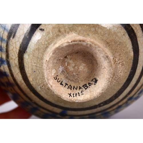 776 - AN EARLY PERSIAN SULTAN ABBAD POTTERY BOWL, with floral decoration, 16cm.