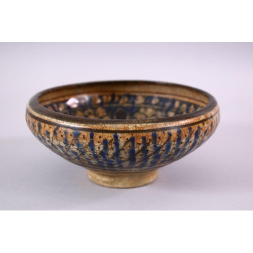 777 - AN EARLY PERSIAN SULTAN ABBAD POTTERY BOWL, with floral motif decoration, 18cm.