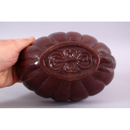 778 - A CARVED HARDSTONE / AGATE MOULDED FORM BOWL, 20cm