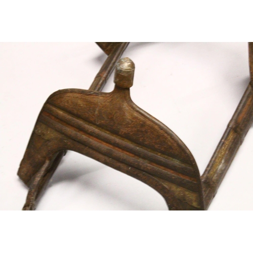 781 - A LARGE WOOD & METAL POSSIBLY EGYPTIAN CAMEL SADDLE / SEAT, the timbers enclosed and decorated with ... 