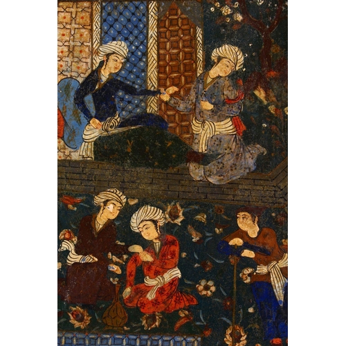 783 - A 18TH / 19TH CENTURY PERSIAN PAPIER MACHE PAINTED PANEL, depicting figures in garden settings, 37cm... 