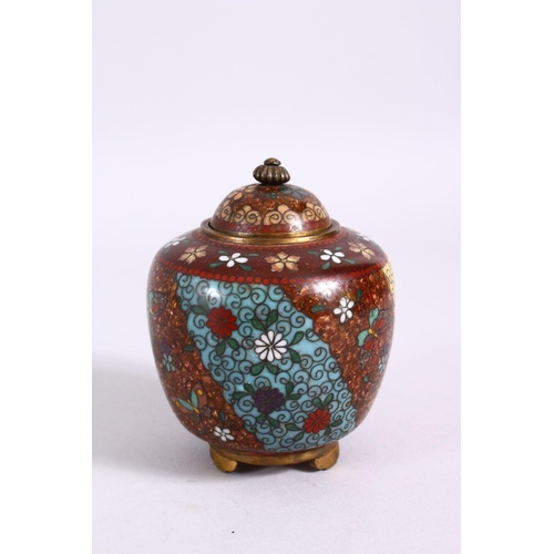 79 - A 19TH CENTURY JAPANESE CLOISONNE POT & COVER, with gold speck decoration with flora upon multi colo... 