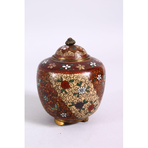 79 - A 19TH CENTURY JAPANESE CLOISONNE POT & COVER, with gold speck decoration with flora upon multi colo... 