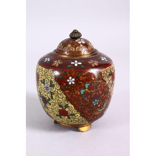 79 - A 19TH CENTURY JAPANESE CLOISONNE POT & COVER, with gold speck decoration with flora upon multi colo... 