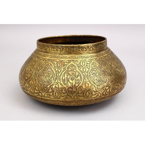 794 - A GOOD 19TH CENTURY DAMASCUS BRASS CARVED BOWL, the bowl carved with formal floral motif, 25cm.