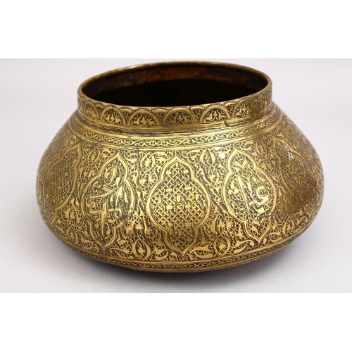 794 - A GOOD 19TH CENTURY DAMASCUS BRASS CARVED BOWL, the bowl carved with formal floral motif, 25cm.