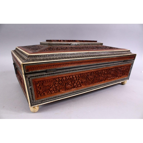 797 - A 19TH CENTURY ANGLO INDIAN INLAID LIDDED SEWING BOX, with carved wood depicting figures and animals... 