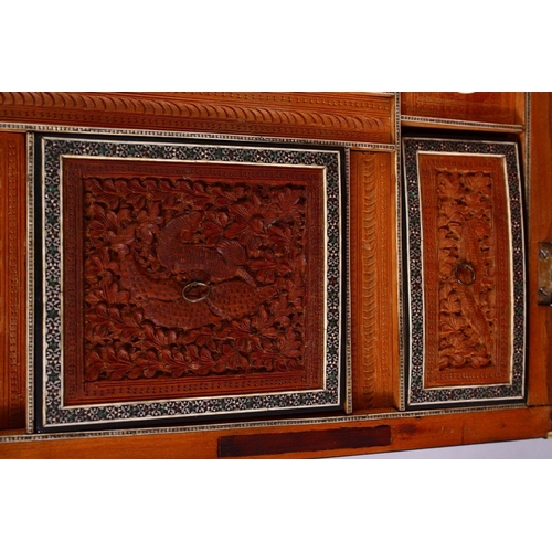 797 - A 19TH CENTURY ANGLO INDIAN INLAID LIDDED SEWING BOX, with carved wood depicting figures and animals... 