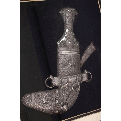 809 - A GOOD 19TH CENTURY TURKISH KINJAL DAGGER IN A FRAME WITH A CAMEL AND OIL POURER, white metal, possi... 