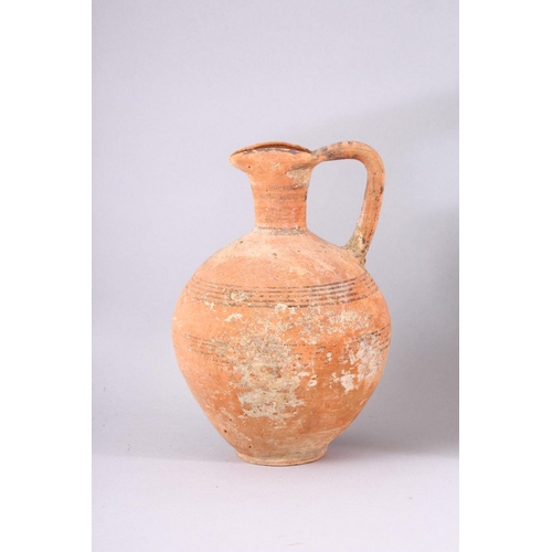 810 - A SMALL COLLECTION OF EXCAVATED POTTERY ITEMS, comprising four teracotta jugs, two small twin handle... 