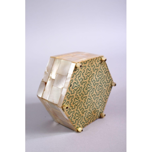 816 - A 19TH CENTURY INDIAN MOTHER OF PEARL LIDDED BOX, the top with carved foliate design, 8cm wide.