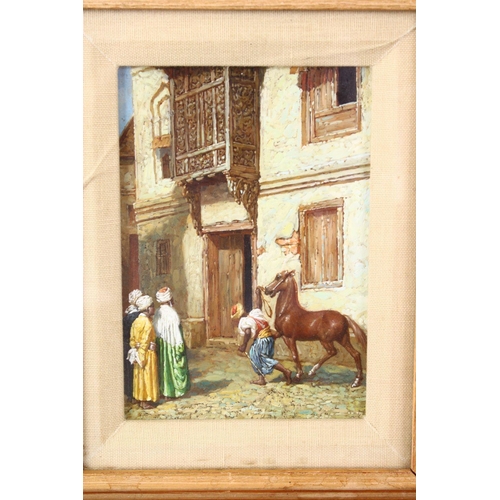 828 - A COLLECTION OF THREE ORIENTALIST FRAMED PAINTINGS