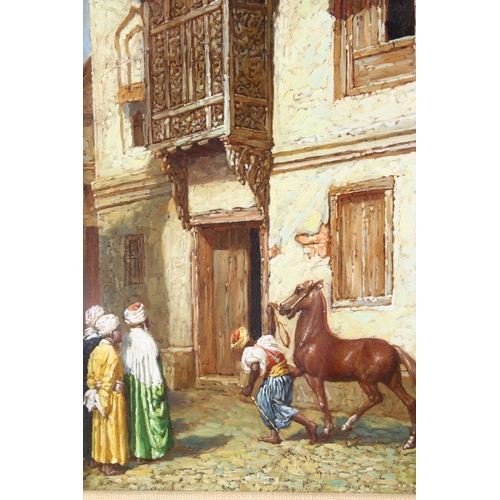 828 - A COLLECTION OF THREE ORIENTALIST FRAMED PAINTINGS