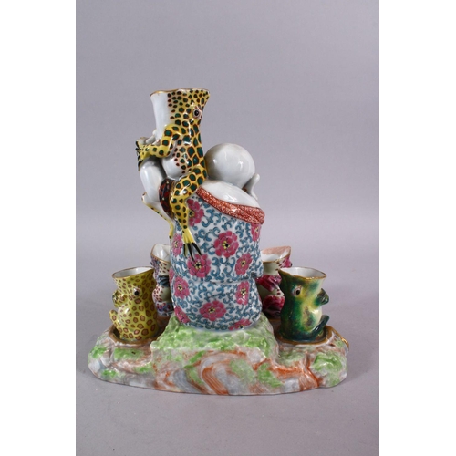 83 - A CHINESE REPUBLIC STYLE PORCELAIN FLOWER / EGG HOLDER OF BUDDHA AND FROGS, the frogs seated with th... 