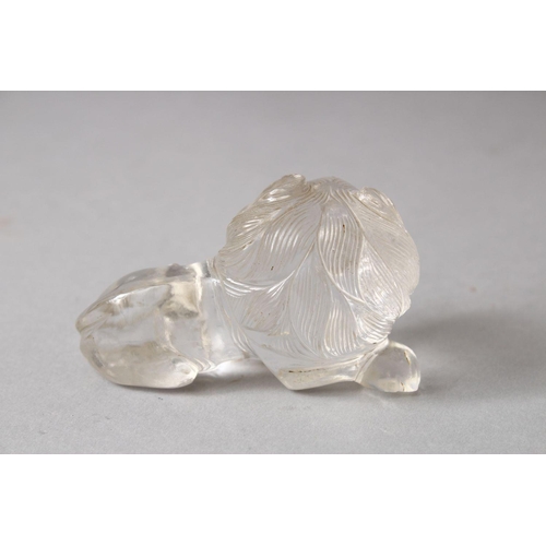 830 - A GOOD ISLAMIC / PERSIAN CARVED ROCK CRYSTAL LION, 7cm.