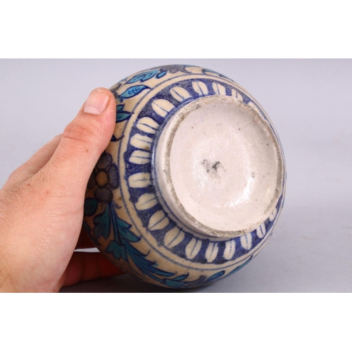 837 - AN GOOD TURKISH POTTERY GLOBULAR VASE, decorated with formal floral decoration, 12cm high.