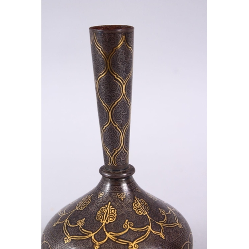 838 - AN 18TH / 19TH CENTURY ISLAMIC GOLD INLAID STEEL VASE, the gold inlay with formal decoration, 13cm.