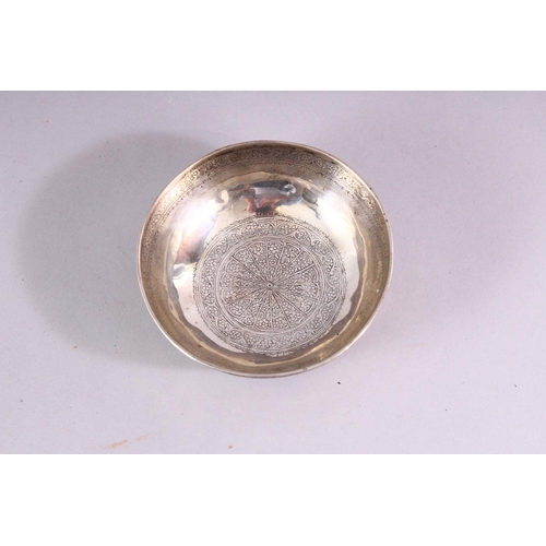 842 - A SMALL PERSIAN SILVER CIRCULAR BOWL, with engraved decoration, 11cm diameter.